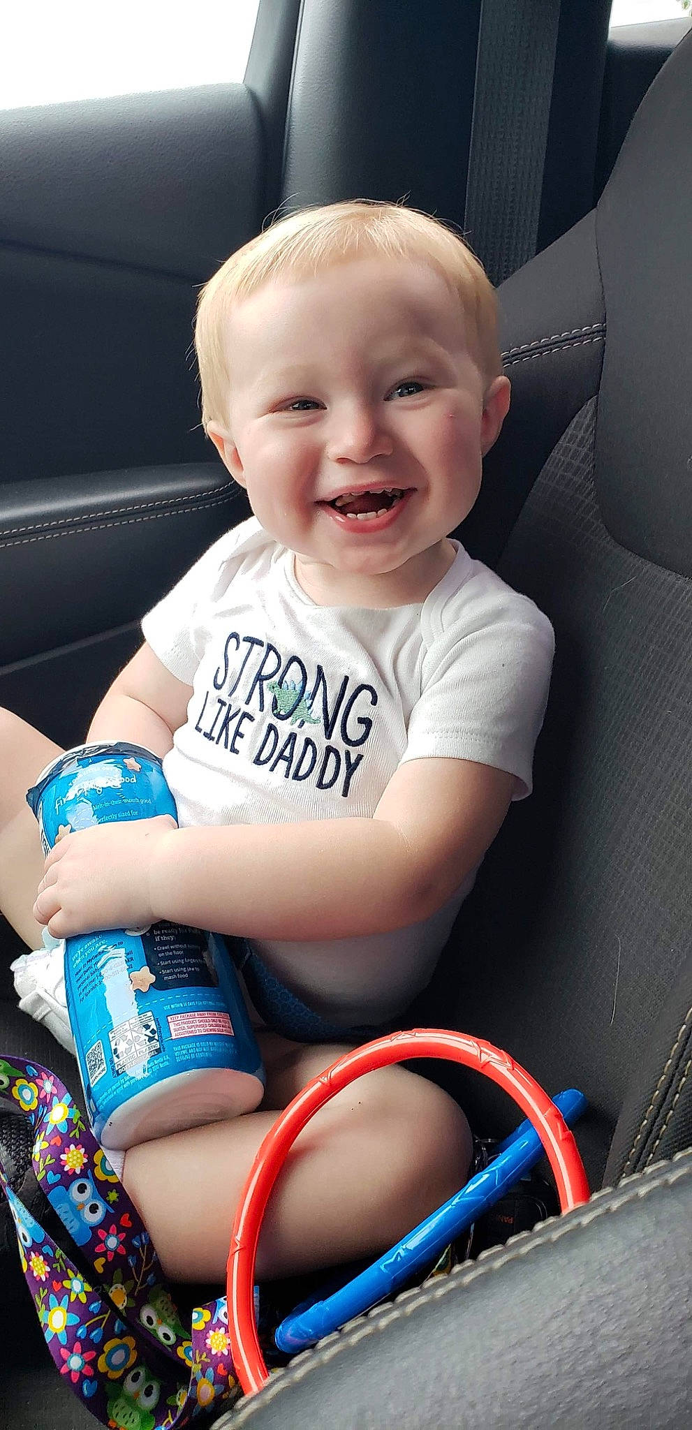 Maddux joined the competition — help win amazing prizes! arm, auto_part, baby, car, car_seat, cheek, child, joy, person, play, sitting, skin, smile, toddler, vehicle