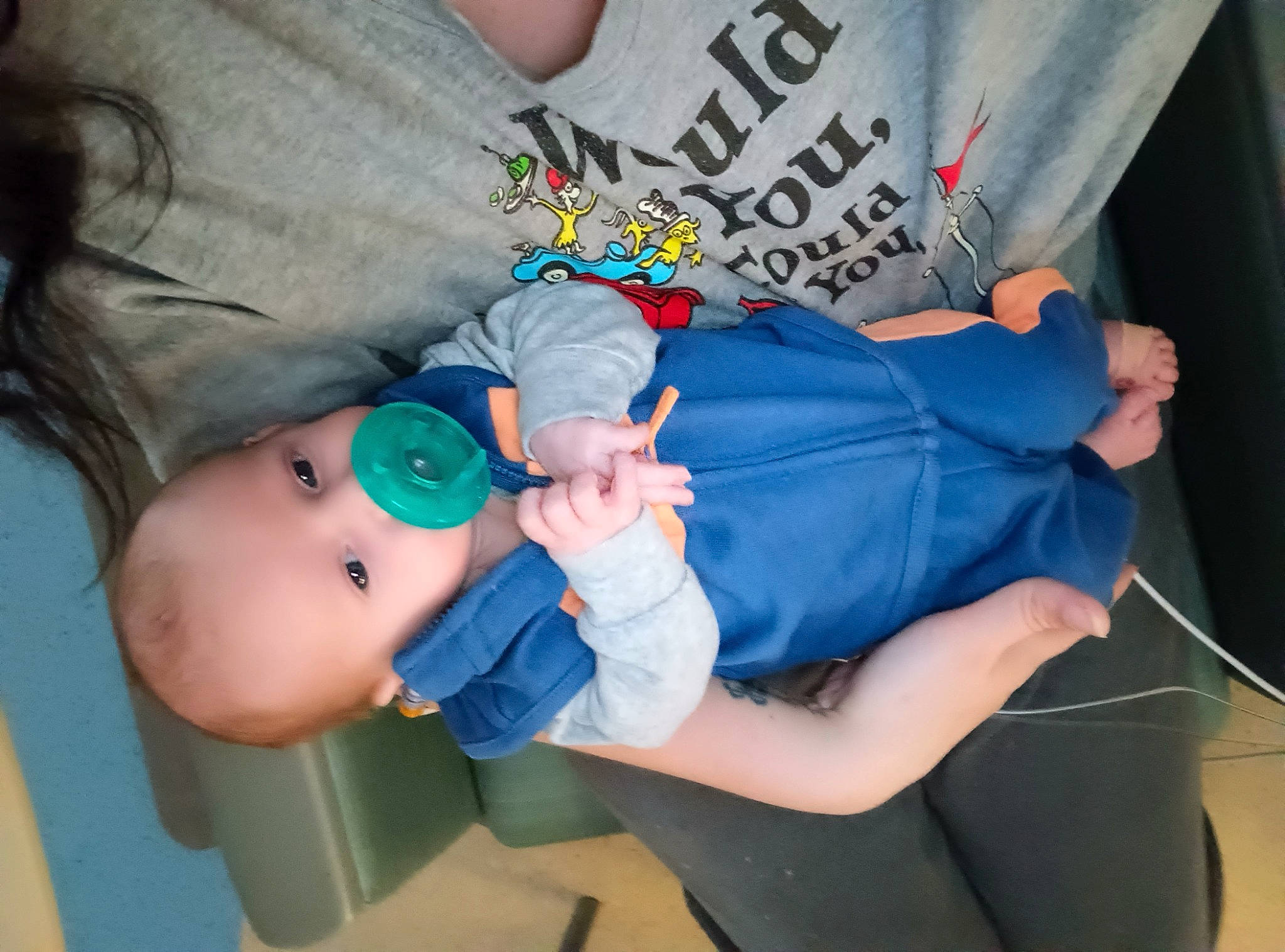 Kenneth is registered to the contest to win money with this photo: baby, baby_products, baby_toddler_clothing, child, comfort, elbow, electric_blue, fun, human_leg, joint, knee, mouth, person, sitting, sleeve, t_shirt, thigh, toddler, wrist
