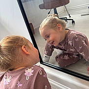 Connie-Rose joined the competition — help win amazing prizes! child, girl, mirror, reflection, indoor, floor, clothing, pattern, purple, bunny, smile, hair, blonde, room, chair, window, wood_floor, playful, happy, casual