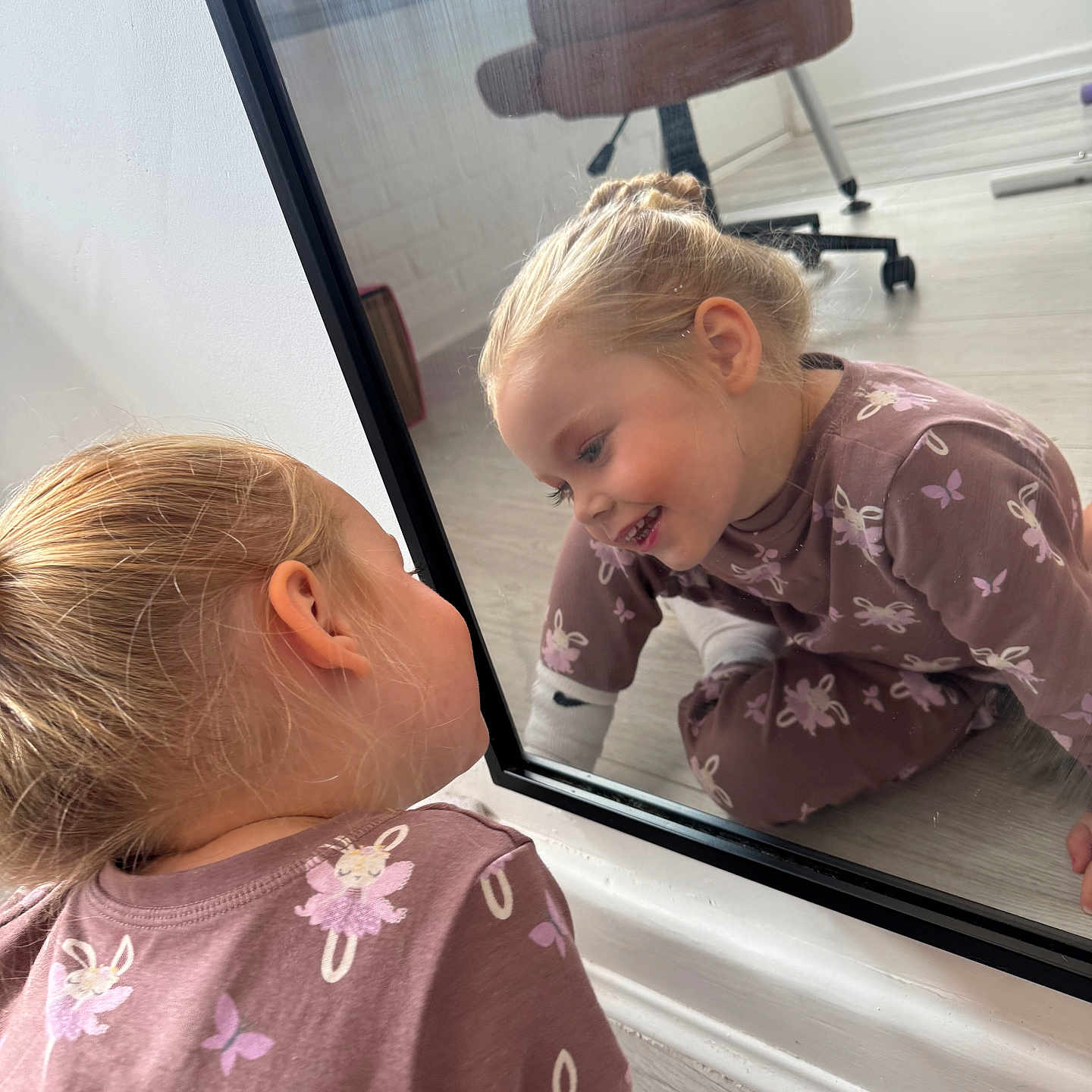 Connie-Rose joined the competition — help win amazing prizes! blonde, bunny, casual, chair, child, clothing, floor, girl, hair, happy, indoor, mirror, pattern, playful, purple, reflection, room, smile, window, wood_floor