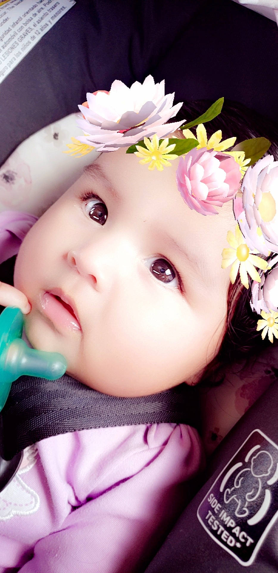 Lea is registered to the contest to win money with this photo: baby, beauty, cheek, child, close_up, eye, face, flower, hair_accessory, head, headgear, lip, mouth, nose, person, petal, photography, pink, plant, skin