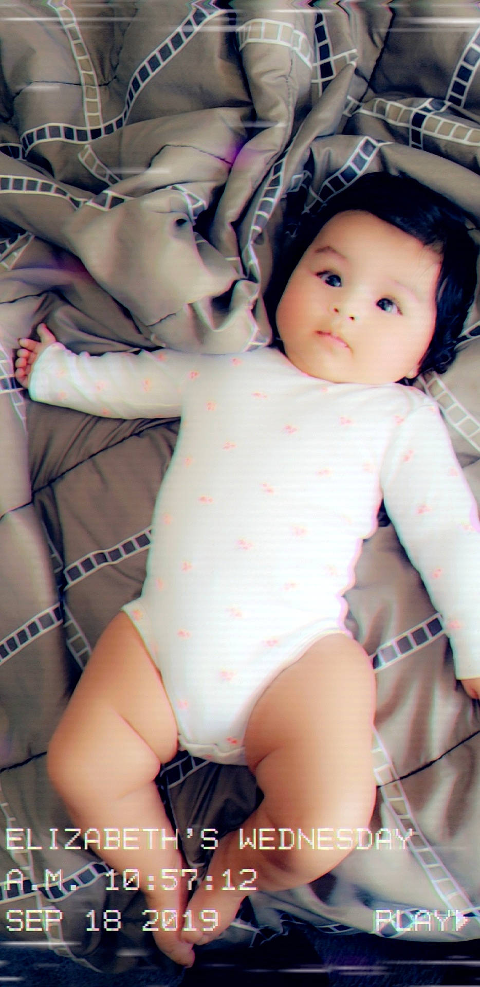 Lea is registered to the contest to win money with this photo: abdomen, baby, black_hair, cheek, child, doll, flesh, leg, person, skin, toddler, toy, trunk