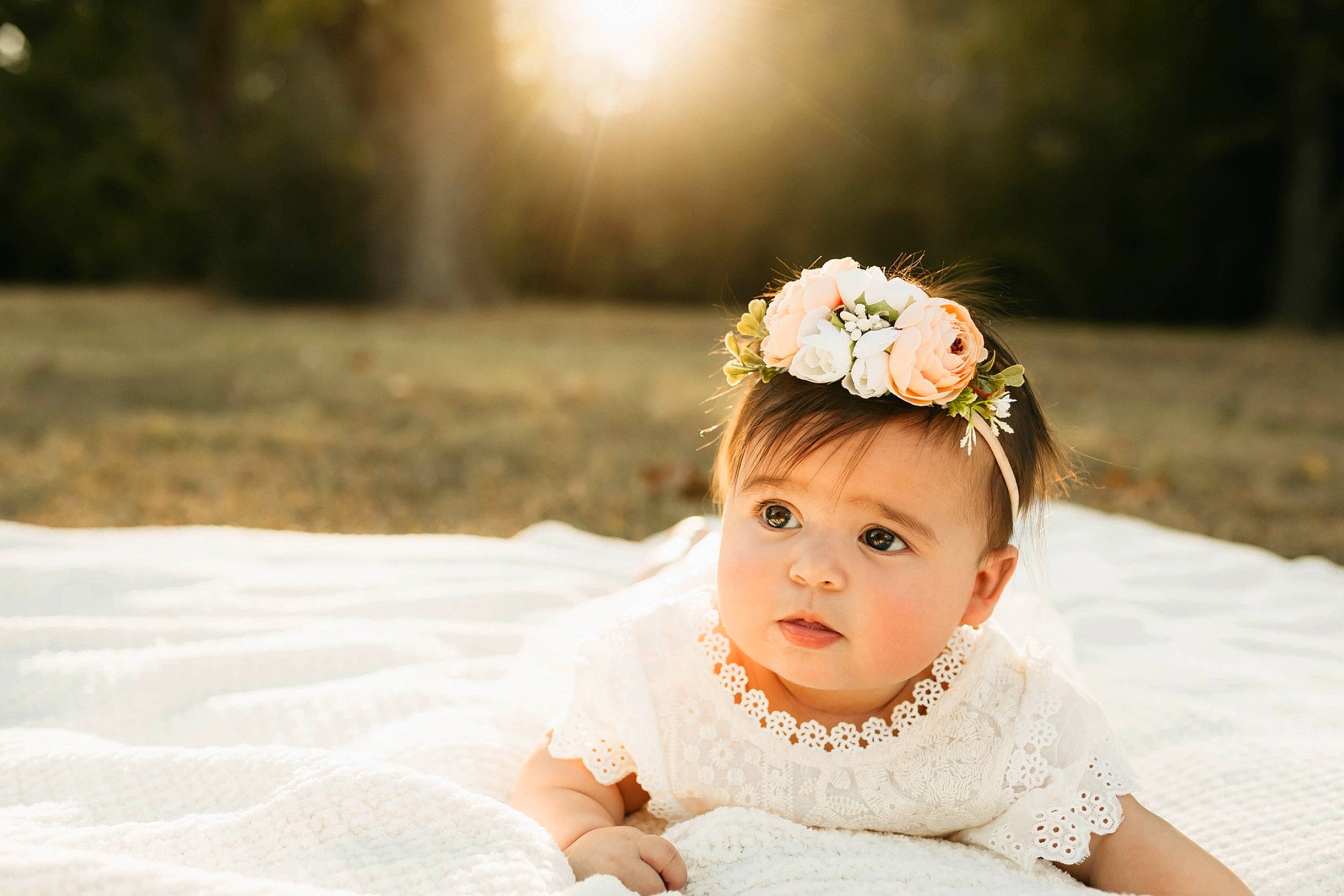 Sianna joined the competition — help win amazing prizes! baby, baby_toddler_clothing, bridal_accessory, dress, embellishment, eye, flash_photography, flower, grass, happy, headband, headgear, headpiece, iris, jewellery, light, person, petal, plant, toddler