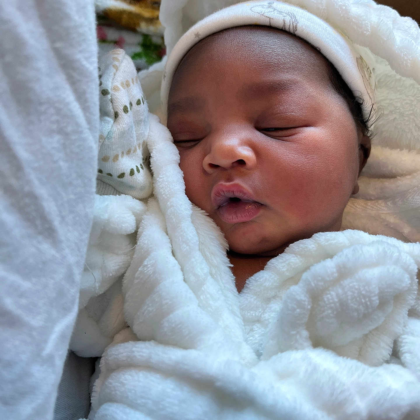 Deayla is registered to the contest to win money with this photo: baby, bed, blanket, bonnet, clothing, crib, face, furniture, glove, hat, head, infantbed, newborn, person, photography, portrait, quilt, sleeping, towel