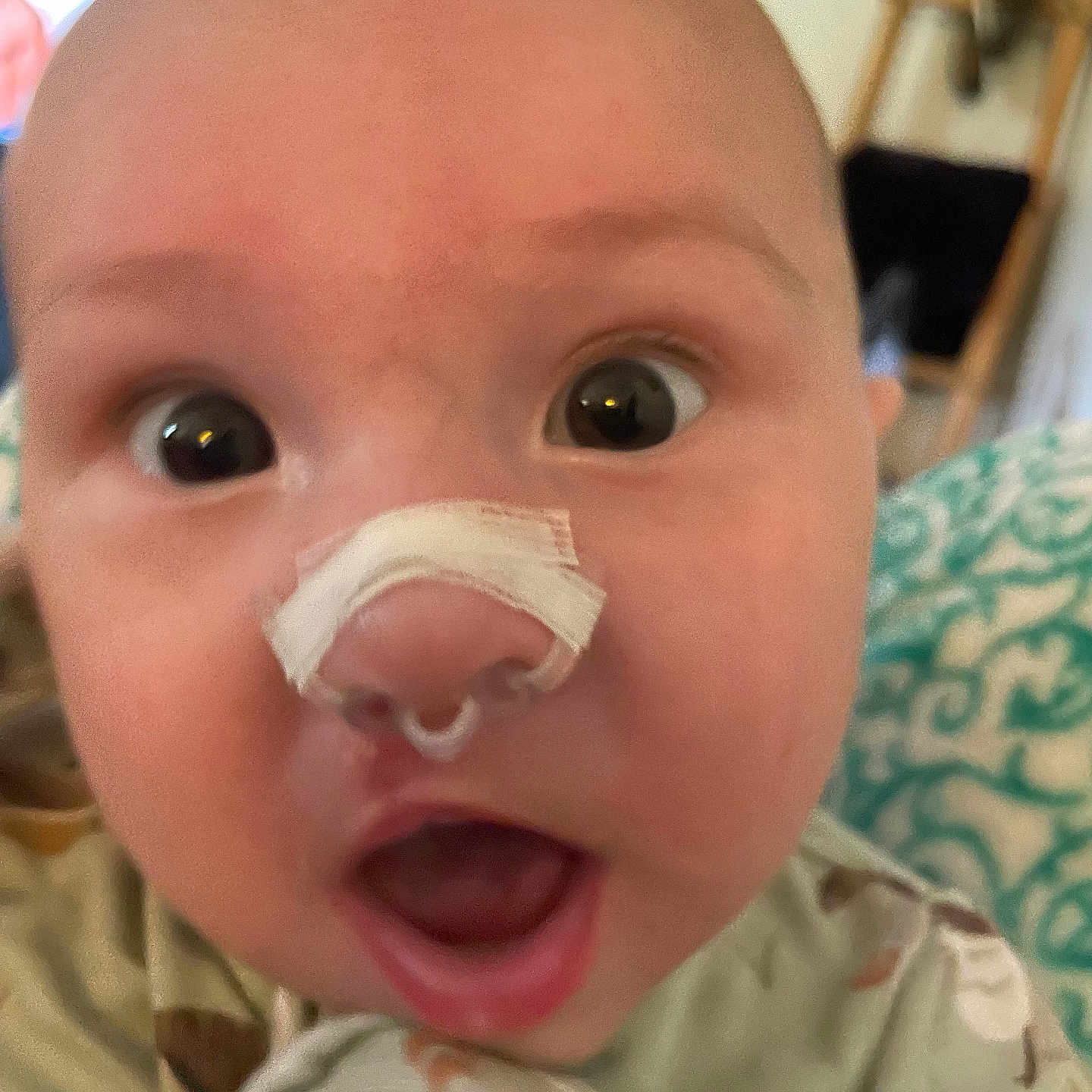 Tulsen is registered to the contest to win money with this photo: baby, bodypart, couch, cream, dessert, face, finger, food, furniture, hand, head, icing, mouth, newborn, person, photography, portrait, selfie, teeth, tongue