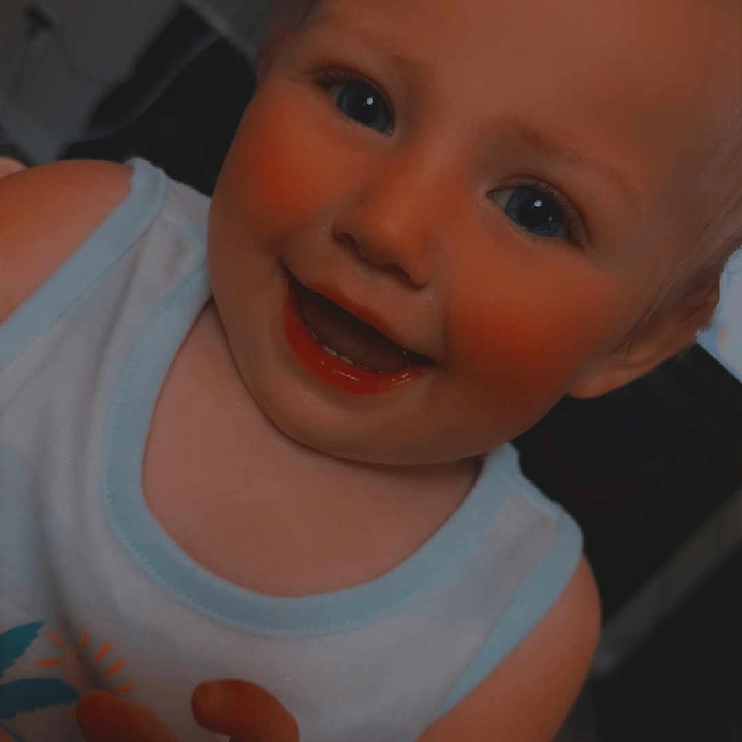 Paizleigh is registered to the contest to win money with this photo: baby, babylaughing, bodypart, cartoon, clothing, face, finger, hand, happy, head, mouth, person, photography, portrait, smile, t_shirt, tanktop, wrist