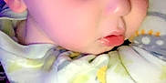 Colton is registered to the contest to win money with this photo: baby, sleeping, infant, face, onesie, child, peaceful, closeup, eyelashes, soft_light, portrait, resting, cute, toddler, human, young, skin, head, clothing, hand