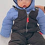 Colton joined the competition — help win amazing prizes! baby, child, snow, winter_clothing, blue_jacket, black_pants, outdoor, cold_weather, puffer_jacket, cute, infant, sitting, snowy_ground, warm_clothes, portrait, face, young_child, winter, curious_expression, hand_support