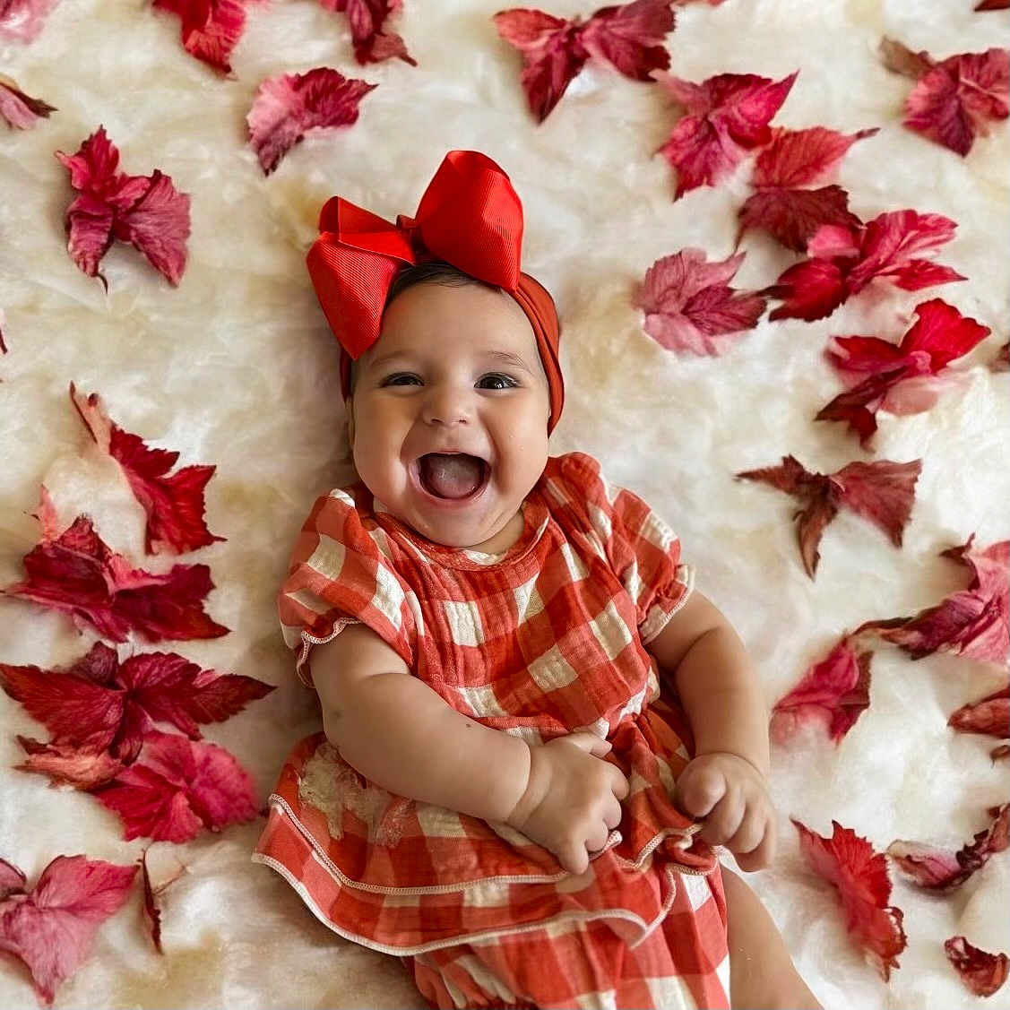 Penny joined the competition — help win amazing prizes! baby, babylaughing, face, flower, happy, head, laughing, leaf, person, petal, photography, plant, portrait, smile