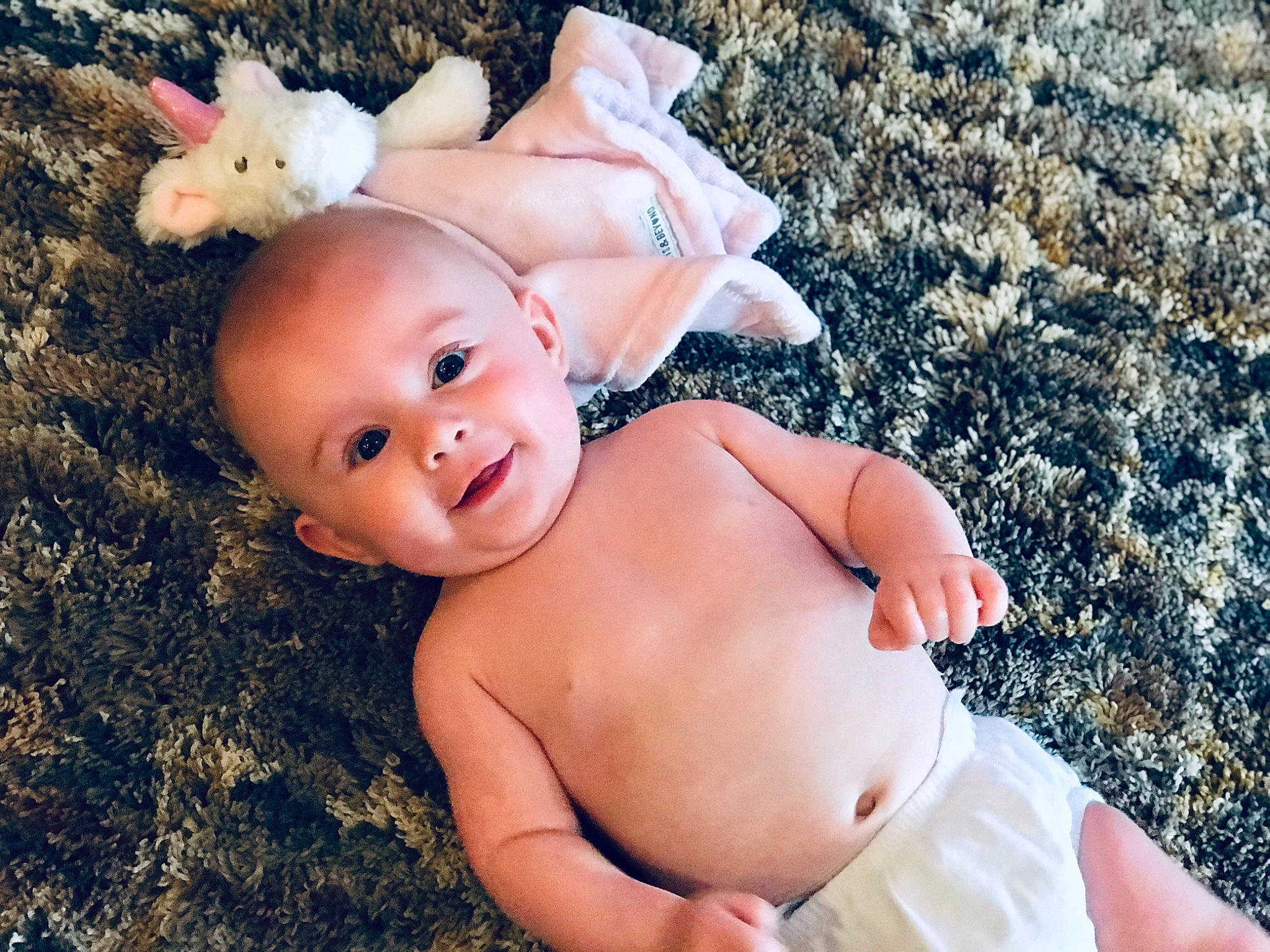 Ally is registered to the contest to win money with this photo: baby, cheek, child, eye, hand, person, photograph, photography, pink, skin, smile, toddler