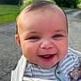 Calvin is registered to the contest to win money with this photo: baby, smile, face, outdoor, infant, blanket, happy, child, person, cute, portrait, striped_clothing, nature, greenery, daylight, closeup, skin, head, cheeks, eyes