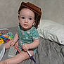 Abraylee is registered to the contest to win money with this photo: baby, child, bed, pillow, marker, toy, basket, clothing, person, indoor, cute, playful, sitting, headwear, expression, furniture, young_child, colorful, blanket, portrait