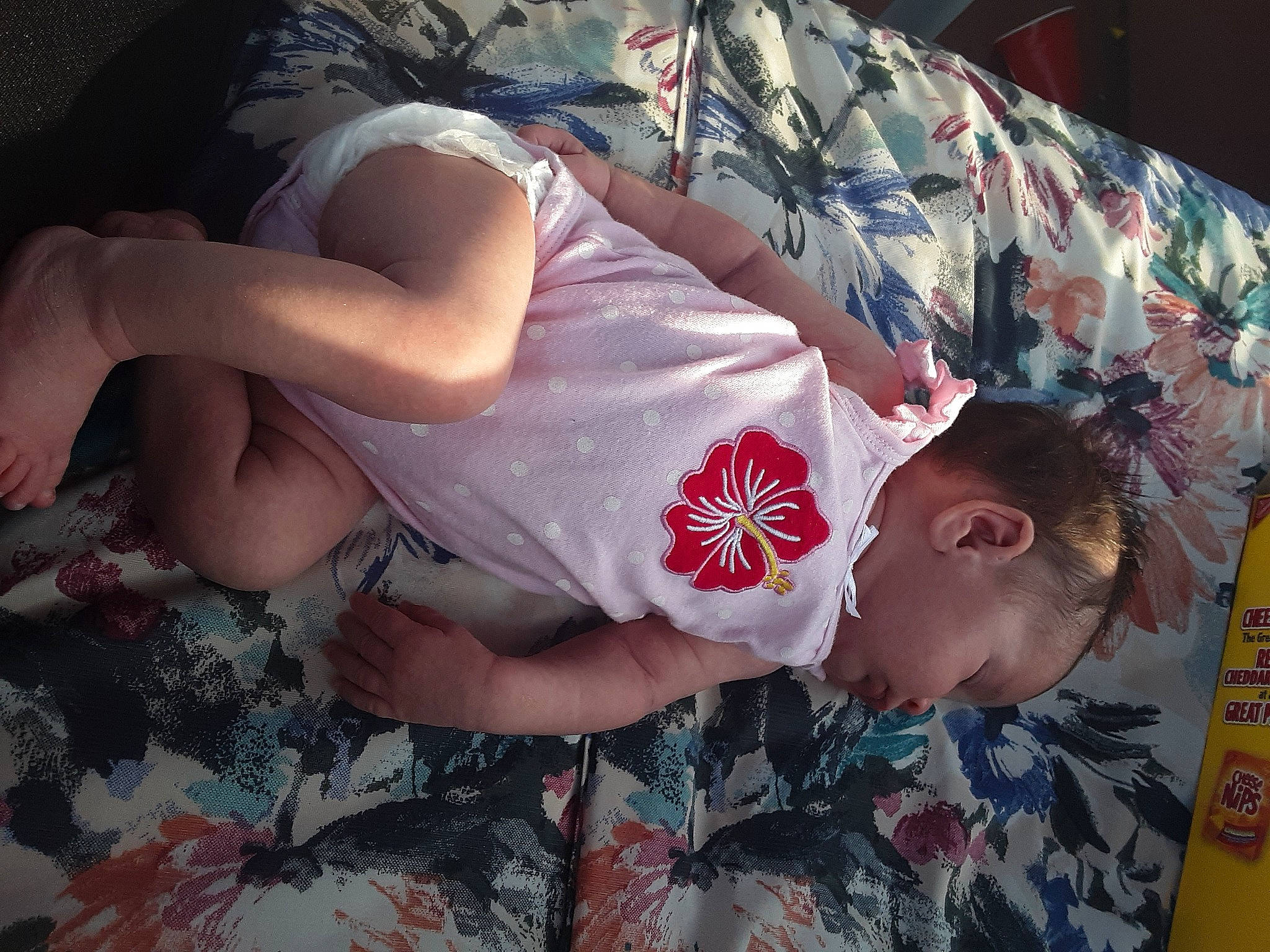 Emelia is registered to the contest to win money with this photo: baby, birth, child, flesh, leg, nap, person, sleep