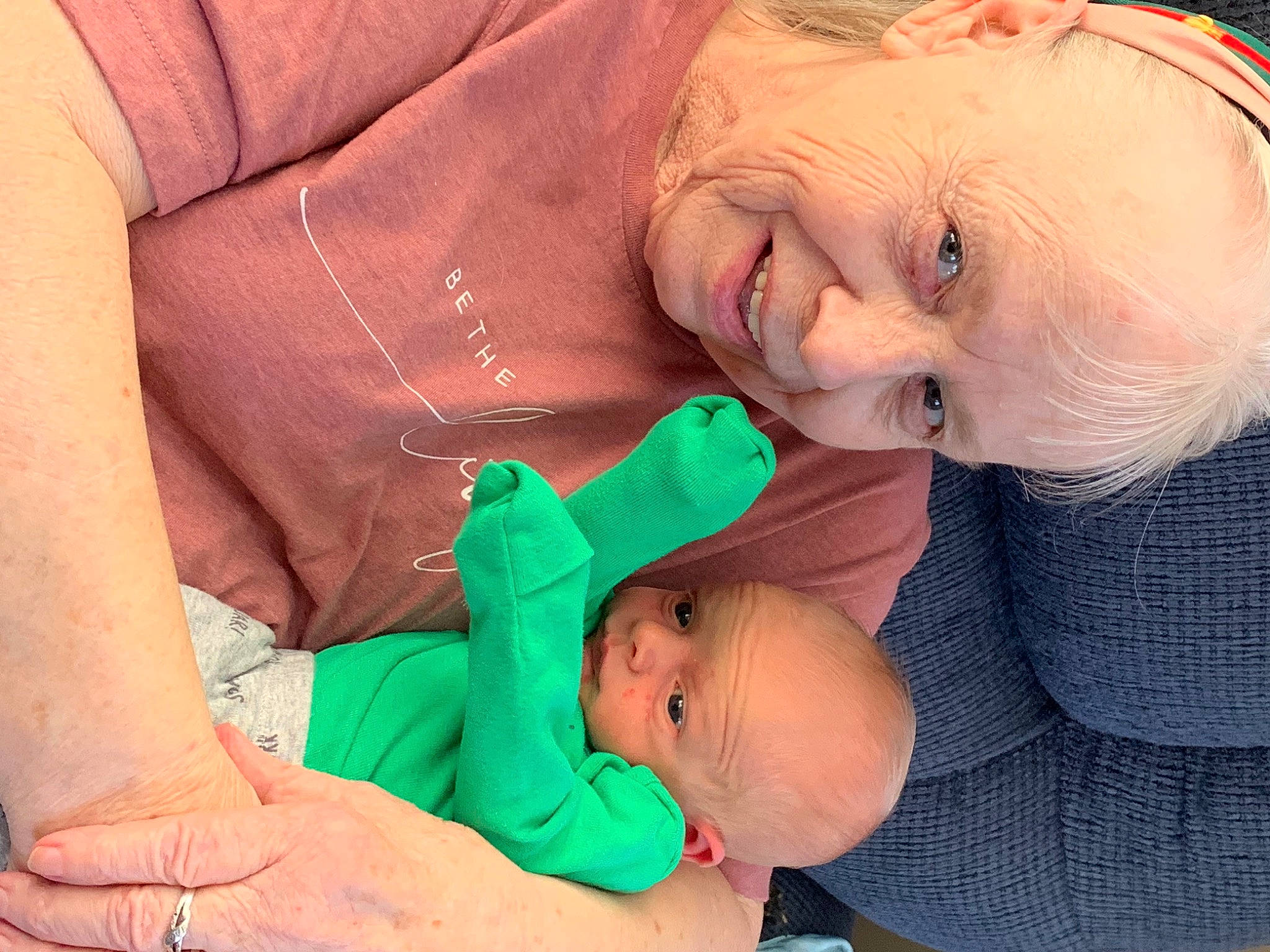 Martin is registered to the contest to win money with this photo: arm, baby, cheek, comfort, face, facial_expression, finger, gesture, glasses, hand, head, human, human_body, joint, joy, leg, mouth, organ, person, skin