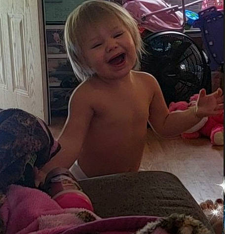 Gabby joined the competition — help win amazing prizes! baby, blond, cheek, child, face, facial_expression, finger, hand, head, human, human_body, laugh, leg, mouth, person, play, sitting, smile, thigh, toddler