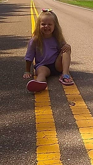 Chole joined the competition — help win amazing prizes! asphalt, child, city, fun, joy, leg, person, play, playground, public_space, recreation, road, road_surface, shadow, sidewalk, snapshot, toddler, walkway, yellow