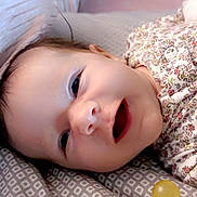 Kamiya joined the competition — help win amazing prizes! baby, child, infant, smiling, happy, face, portrait, lying_down, pajamas, floral_pattern, pacifier, cushion, bedding, pillow, indoor, nursery, close_up, brown_hair, eyes_open, cozy