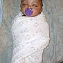 Jeremiah is registered to the contest to win money with this photo: baby, sleeping, pacifier, blanket, swaddled, infant, bed, cozy, child, peaceful, indoors, resting, cute, young, comfort, fabric, person, head, face, soft