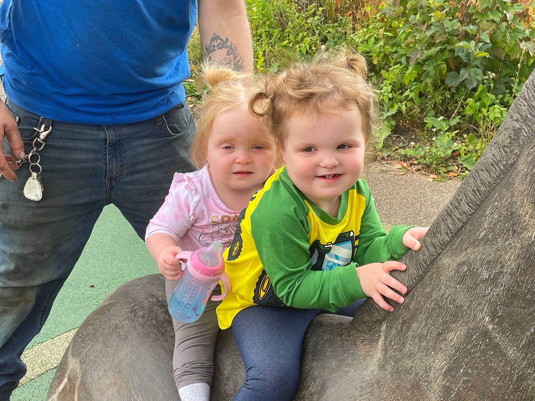 Catherine is registered to the contest to win money with this photo: clothing, facial_expression, gesture, grass, hairstyle, happy, head, human_body, iris, jeans, joy, leaf, nature, organ, people_in_nature, person, plant, product, skin, smile