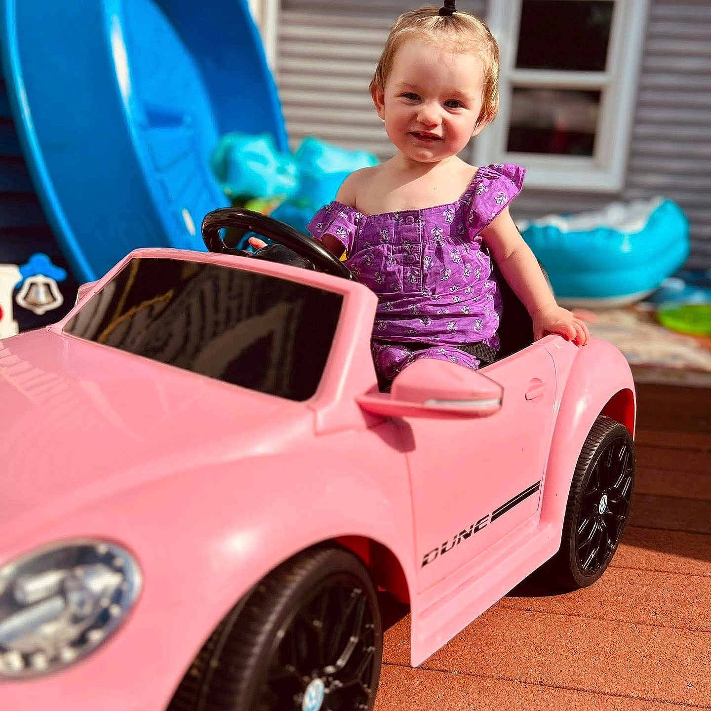 Aurora joined the competition — help win amazing prizes! backyard, casual, child, cute, daylight, fun, happy, outdoor, pink_car, playground, playtime, portrait, purple_clothing, small_child, smiling, summer, toddler, toy_car, vehicle, young_child