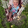 baby, child, smiling, hammock, outdoor, grass, tree, bow, clothing, happy, infant, nature, person, sitting, summer, sunlight, young, cute, playful, portrait