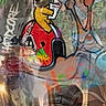 dog, graffiti, street_art, spray_paint, collage, colorful, urban, hat, sunglasses, illustration, canine, artwork, spray_can, wall, abstract, painting, portrait, character, vibrant, mixed_media