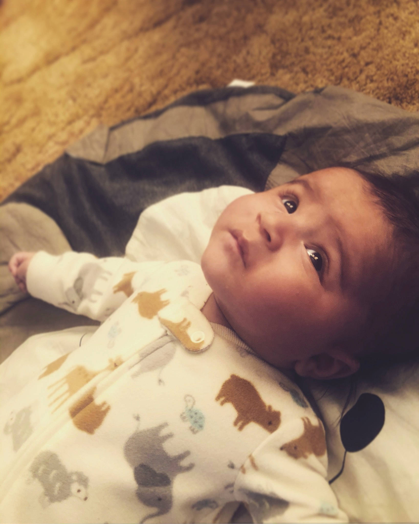 Jordan is registered to the contest to win money with this photo: baby, baby_products, baby_toddler_clothing, cheek, child, eye, eyebrow, facial_expression, forehead, human, linens, lip, nose, person, skin, toddler