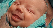 Carl joined the competition — help win amazing prizes! baby, smile, face, blanket, infant, portrait, closeup, soft_texture, turquoise, wrapped, sleepy, cute, newborn, child, skin, happy, cozy, warm, peaceful, artistic_effect
