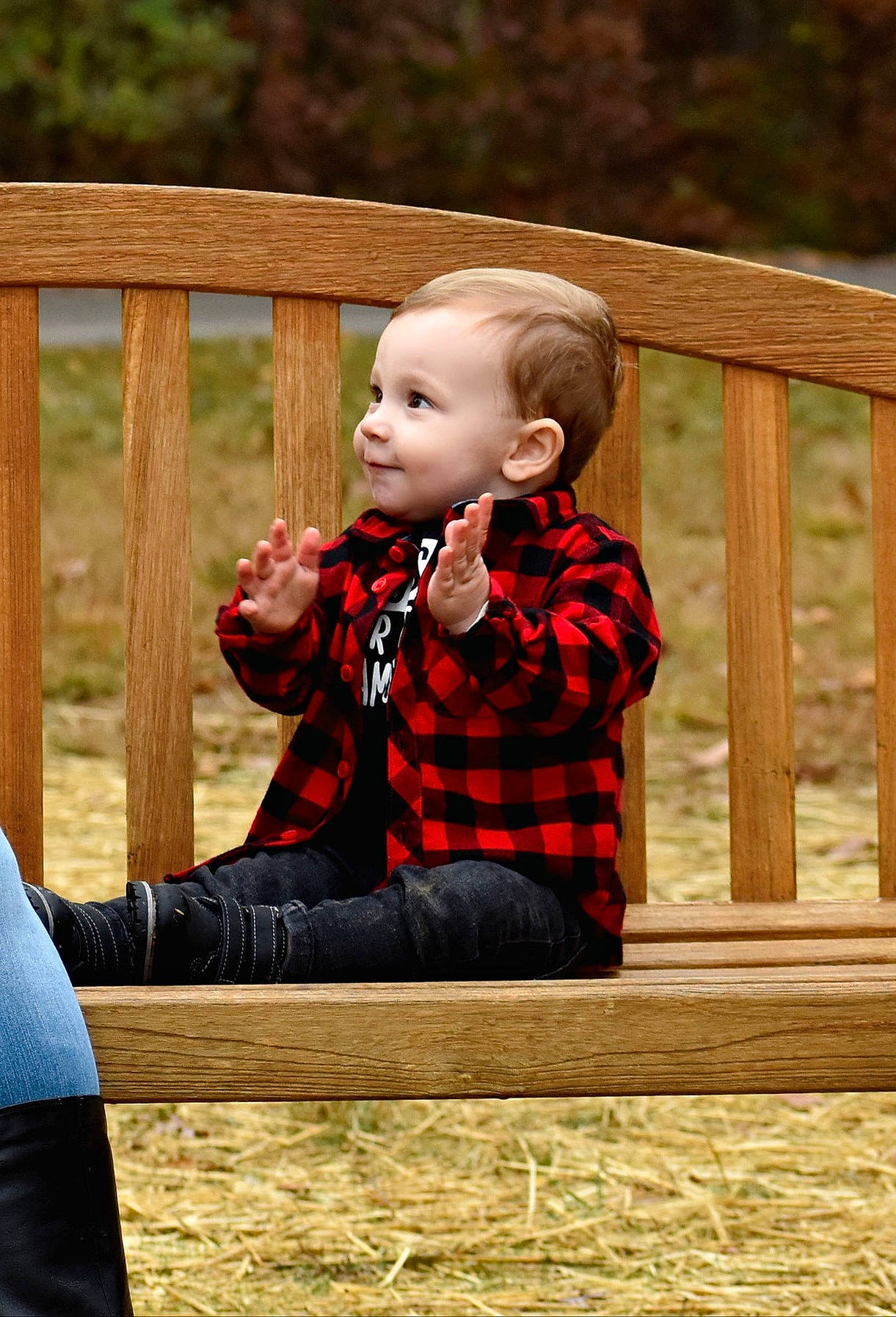 Waylon joined the competition — help win amazing prizes! baby, baby_toddler_clothing, chair, child, dress, flooring, fun, grass, happy, leisure, pattern, people_in_nature, person, plaid, plant, recreation, sitting, tartan, toddler, tree