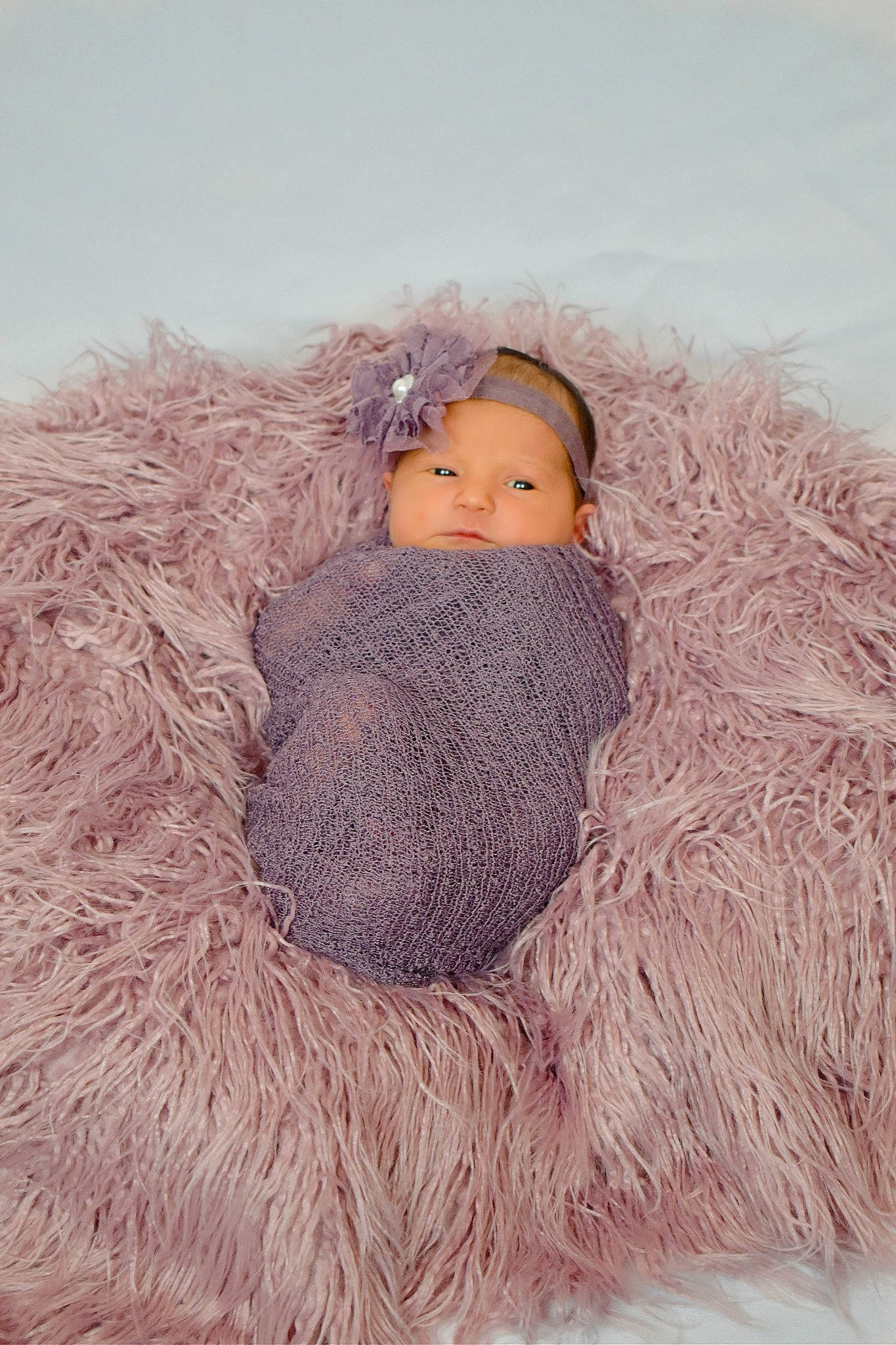 Jessa is registered to the contest to win money with this photo: art, baby, cap, costume_hat, doll, dress, fashion_accessory, feather, freezing, fur, fur_clothing, head, headgear, headwear, outerwear, painting, person, textile, toy, tree