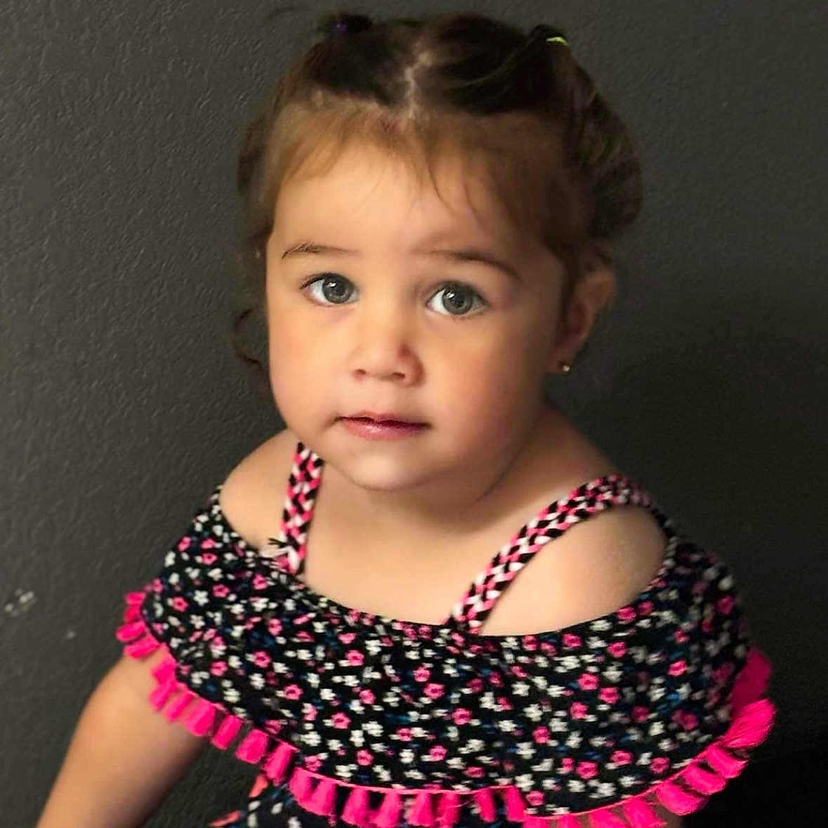 Arabella is registered to the contest to win money with this photo: accessories, blouse, child, clothing, dress, earring, face, female, frown, girl, hair, head, jewelry, necklace, pattern, person, photography, portrait, purple, sad