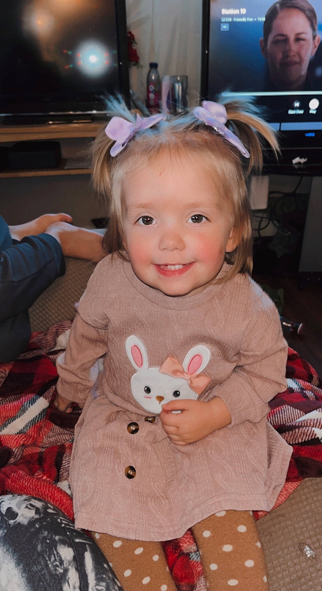 Everleigh joined the competition — help win amazing prizes! baby, baby_toddler_clothing, cheek, child, christmas_eve, event, fun, happy, holiday, iris, joy, organ, pattern, person, pink, sitting, skin, smile, sock, television