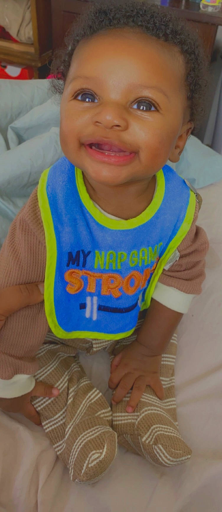 Antwan is registered to the contest to win money with this photo: baby, baby_products, baby_toddler_clothing, cheek, chest, child, cool, elbow, electric_blue, happy, joy, mouth, nose, person, skin, sleeve, smile, t_shirt, thigh, thumb