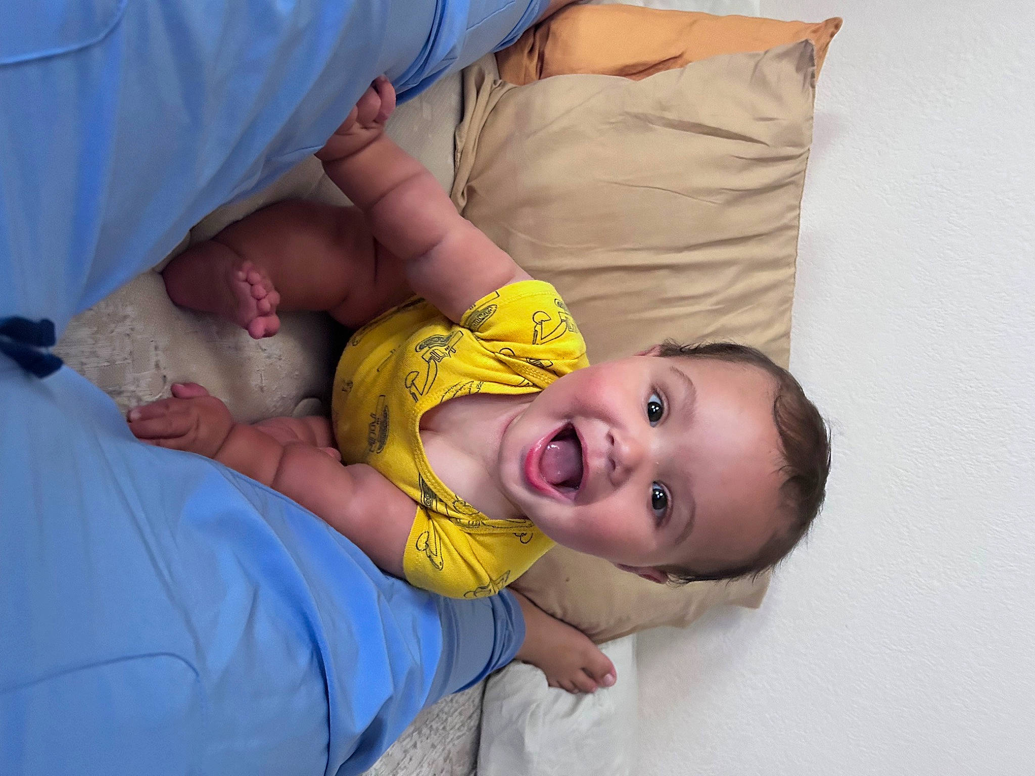 Jaylen is registered to the contest to win money with this photo: abdomen, baby, baby_toddler_clothing, chest, child, comfort, elbow, event, fun, gesture, grass, hand, happy, joint, mouth, person, sleep, smile, surprise, t_shirt