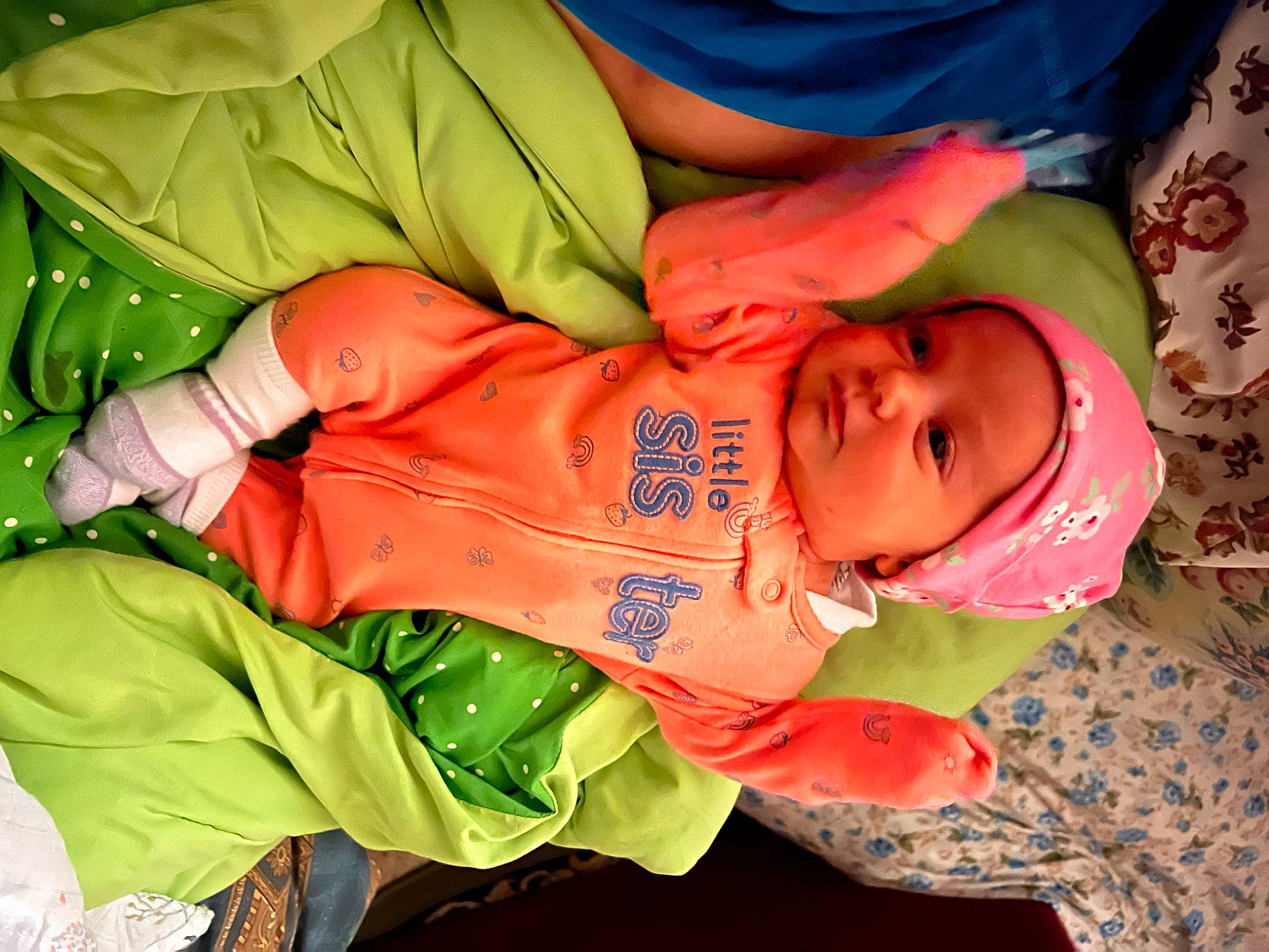 Celeste joined the competition — help win amazing prizes! baby, baby_products, baby_toddler_clothing, bedtime, cheek, child, clothing, comfort, fun, green, head, headwear, human_body, mouth, nose, orange, person, product, room, sleeve