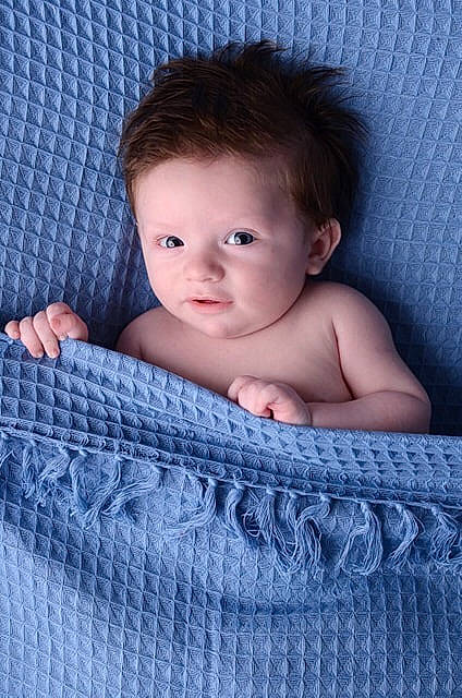 Ethan participe au concours pour gagner de l'argent avec cette photo : baby, baby_products, beauty, blanket, blue, cheek, child, eye, face, head, iris, linens, lip, nose, person, product, skin, smile, textile, toddler