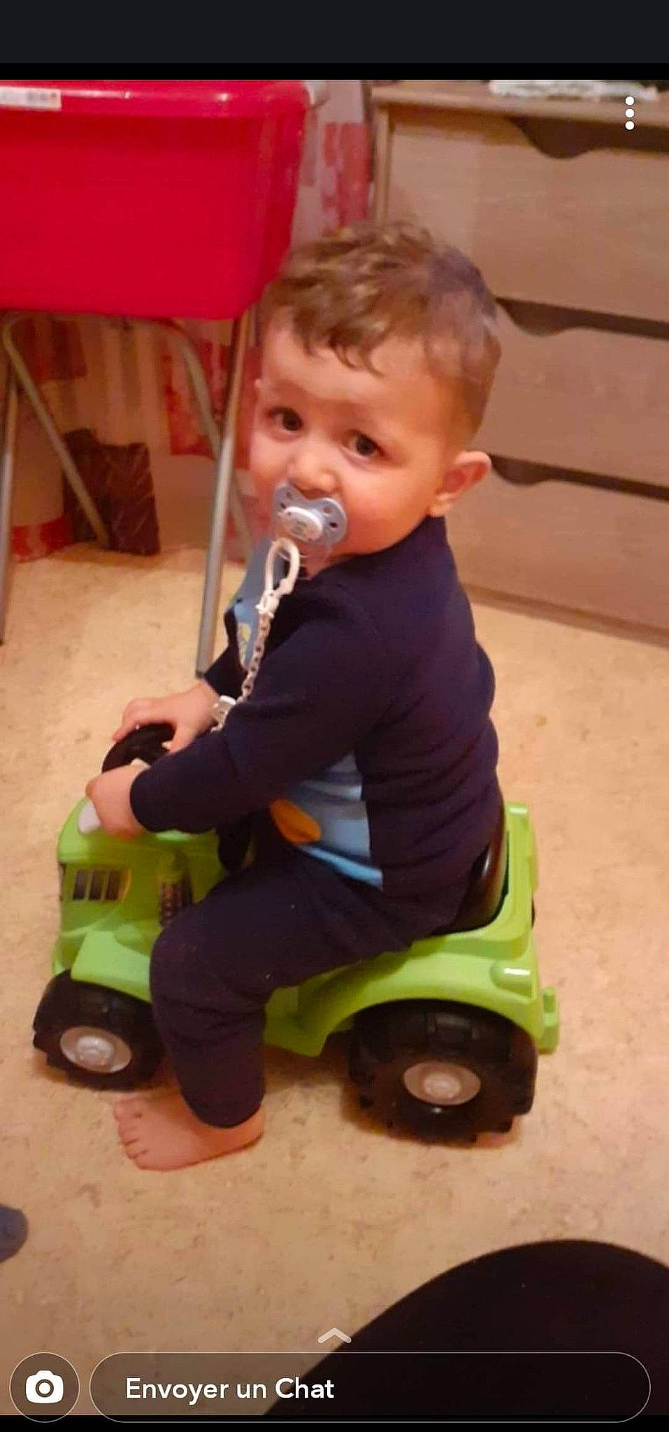 Méziane participe au concours pour gagner de l'argent avec cette photo : baby, baby_toddler_clothing, child, cleanliness, fun, grass, head, motor_vehicle, person, play, product, riding_toy, rolling, sitting, tire, toddler, toy, toy_vehicle, vehicle, wheel