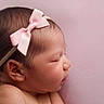 Jennie is registered to the contest to win money with this photo: newborn, baby, sleeping, pink_bow, headband, infant, profile, soft_skin, peaceful, cute, child, portrait, closeup, face, human, sleep, adorable, toddler, pink_background, resting