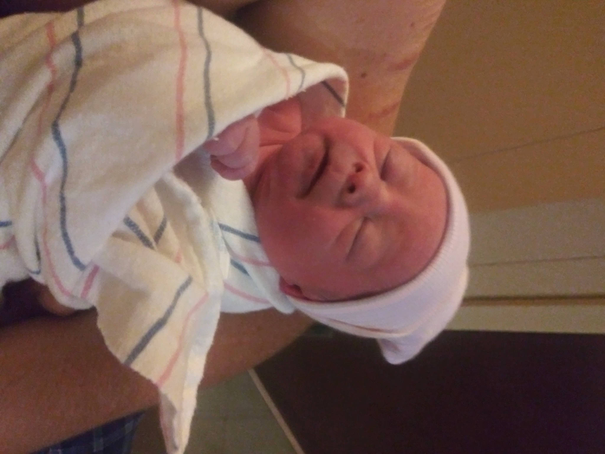 Anara is registered to the contest to win money with this photo: baby, baby_toddler_clothing, cheek, child, childbirth, collar, comfort, ear, elbow, flesh, fun, gesture, happy, person, room, sleeve, thumb, toddler, wrinkle