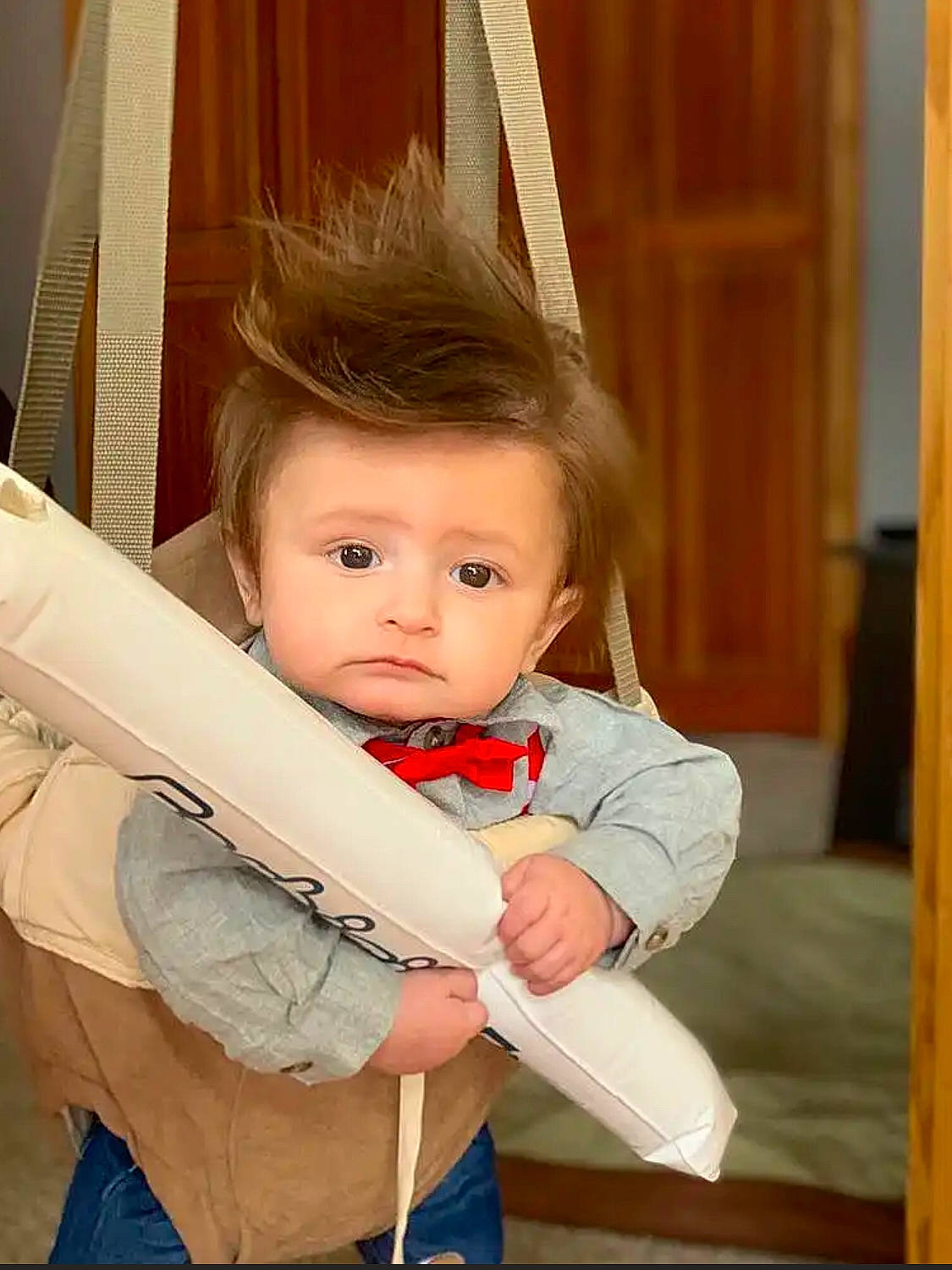 Charlie is registered to the contest to win money with this photo: baby, baby_toddler_clothing, beauty, blond, brown_hair, chair, cheek, child, chin, eye, face, fun, hair, hairstyle, happy, hardwood, iris, person, room, toddler