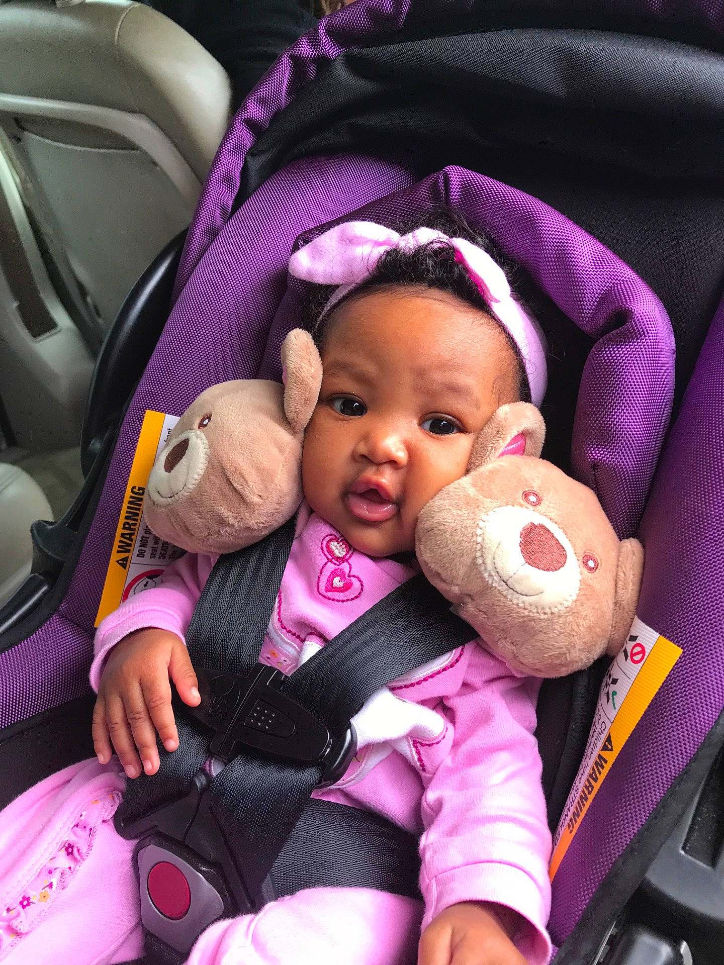 Zaila is registered to the contest to win money with this photo: baby_carriage, car_seat, child, fun, girl, infant, person, pink, product, purple, toddler