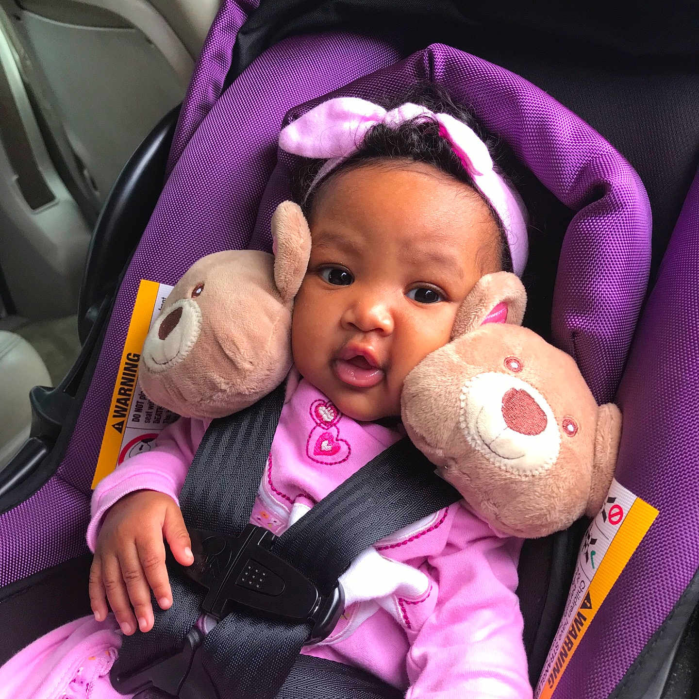 Zaila is registered to the contest to win money with this photo: baby_carriage, car_seat, child, fun, girl, infant, person, pink, product, purple, toddler