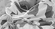 Remington is registered to the contest to win money with this photo: baby, black_and_white, blanket, child, closeup, cozy, cute, fabric, hat, headwear, indoors, infant, newborn, pacifier, peaceful, portrait, resting, sleeping, soft, wrapped
