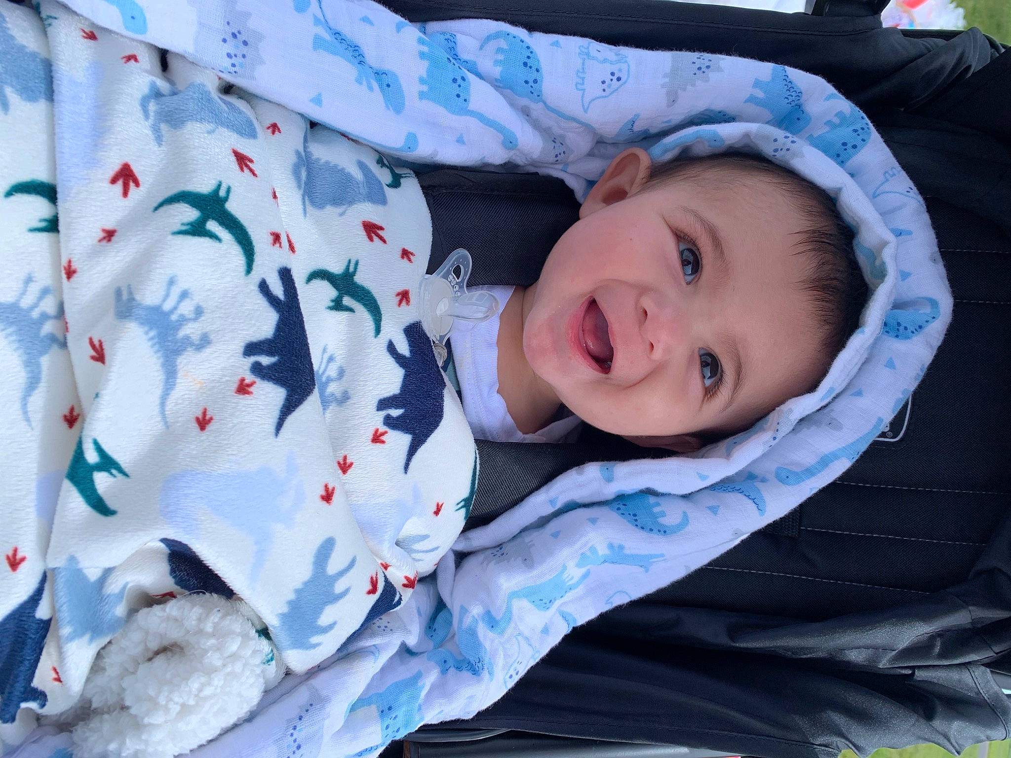 Chico is registered to the contest to win money with this photo: baby, baby_laughing, baby_products, baby_toddler_clothing, carmine, cheek, child, comfort, eye, face, happy, head, headwear, linens, person, product, skin, sleeve, smile, toddler