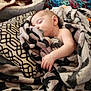 Ronan joined the competition — help win amazing prizes! baby, blanket, cat, child, comfort, cozy, cute, furniture, home, indoor, napping, pacifier, patterned_blanket, peaceful, pet, pillow, resting, sleeping, soft, toddler