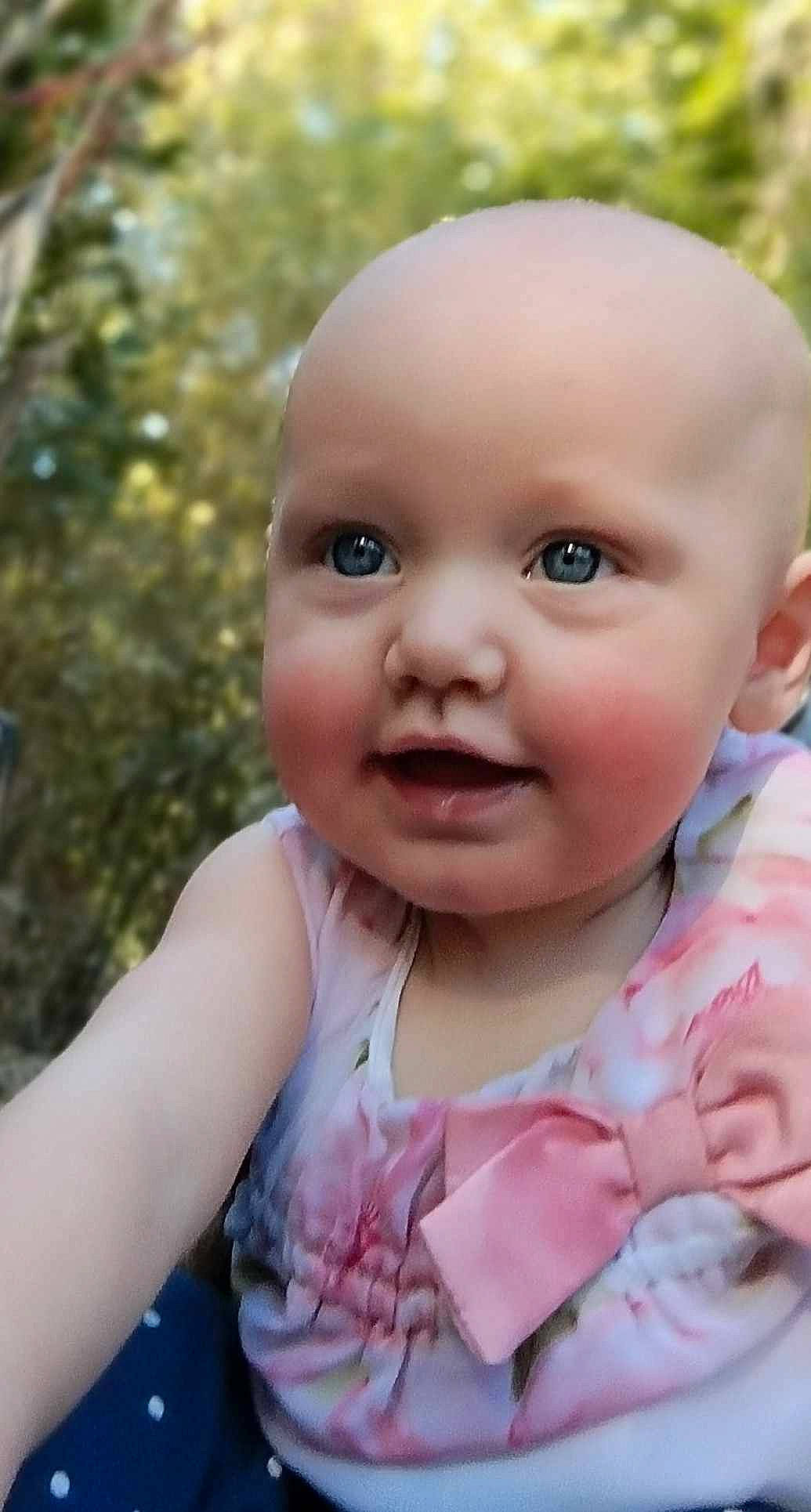 Hazzel is registered to the contest to win money with this photo: baby, baby_toddler_clothing, cheek, child, chin, eye, eyelash, fun, grass, happy, iris, joy, lip, mouth, nose, person, pink, portrait_photography, sitting, skin