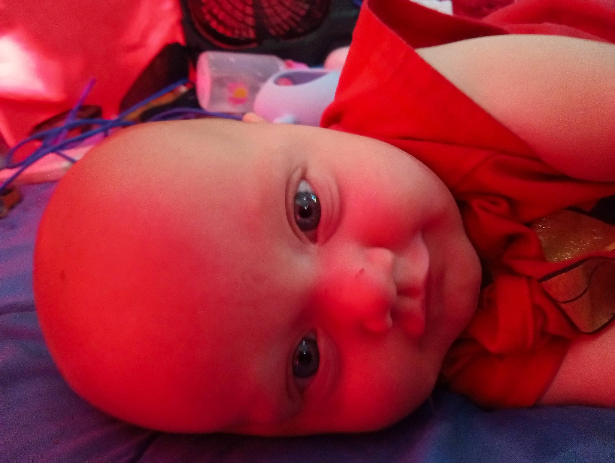 Hazzel is registered to the contest to win money with this photo: baby, baby_toddler_clothing, cheek, eye, eyebrow, eyelash, finger, hand, headgear, human_body, iris, lip, mouth, muscle, neck, nose, orange, person, pink, skin