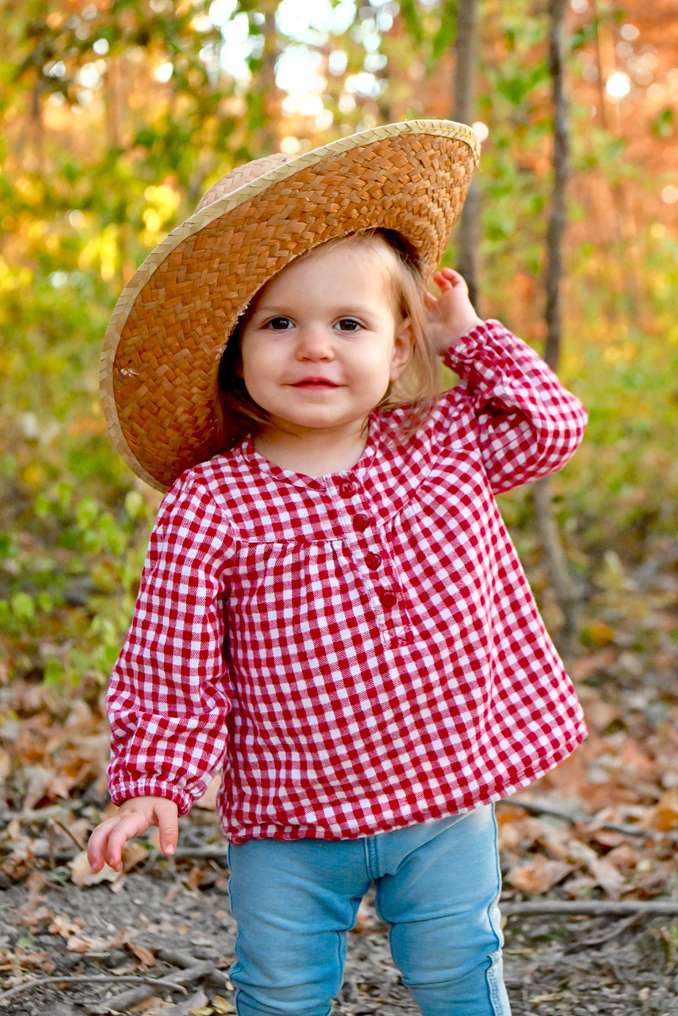 Ruby joined the competition — help win amazing prizes! baby_toddler_clothing, child, grass, happy, hat, headwear, jeans, joy, outerwear, pattern, people_in_nature, person, photograph, plaid, plant, sleeve, smile, standing, tartan, textile