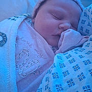 Oliwia is registered to the contest to win money with this photo: newborn, baby, sleeping, blanket, hat, clothing, closeup, infant, cute, soft, cozy, indoors, rest, peaceful, face, person, child, toddler, swaddled, warm