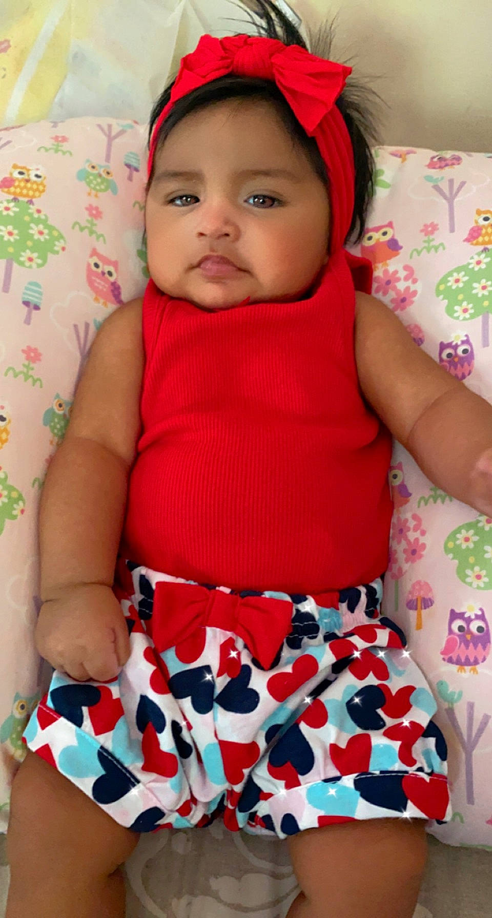 Madelynn is registered to the contest to win money with this photo: baby, baby_toddler_clothing, cheek, child, clothing, dress, eye, face, green, happy, head, headwear, outerwear, person, pink, product, red, skin, sleeve, textile